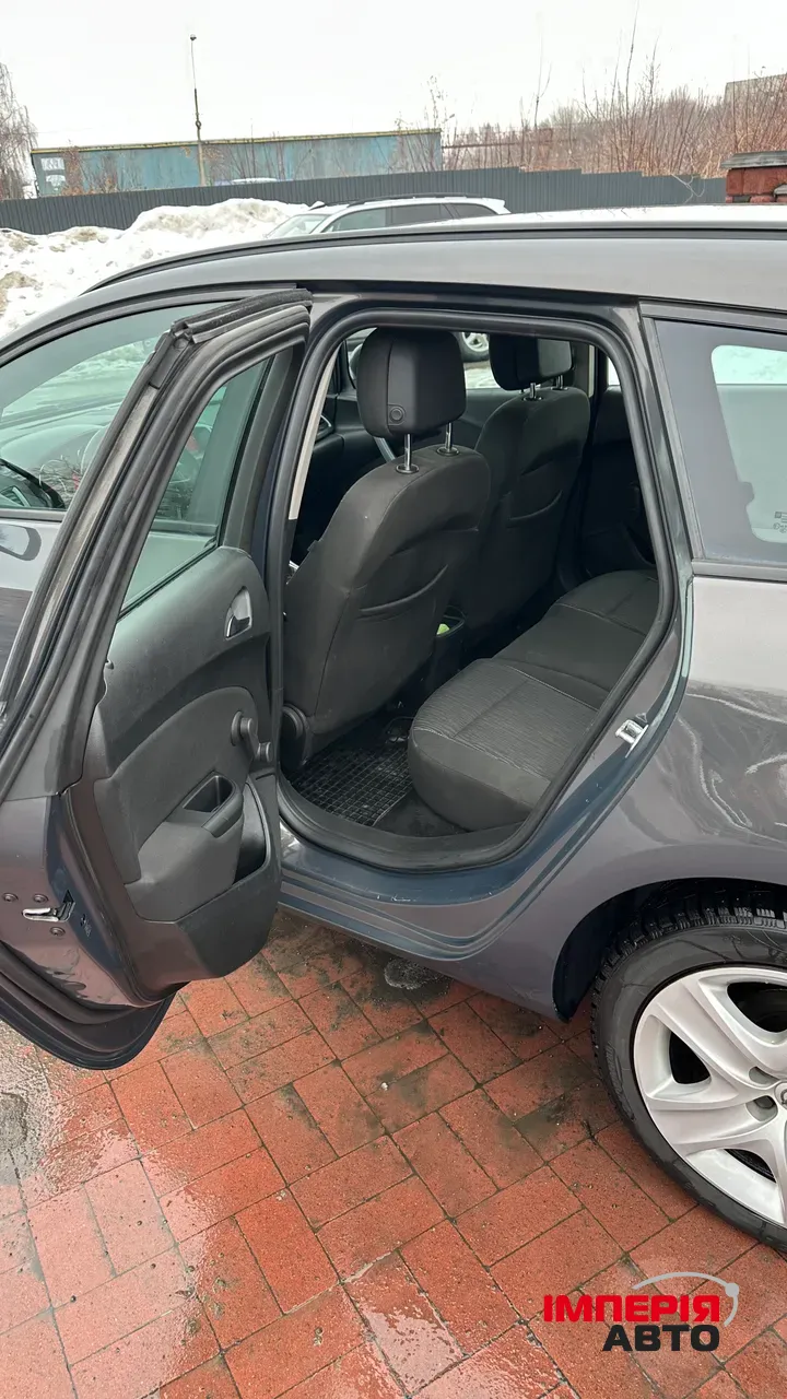 Opel Astra - фото 9
