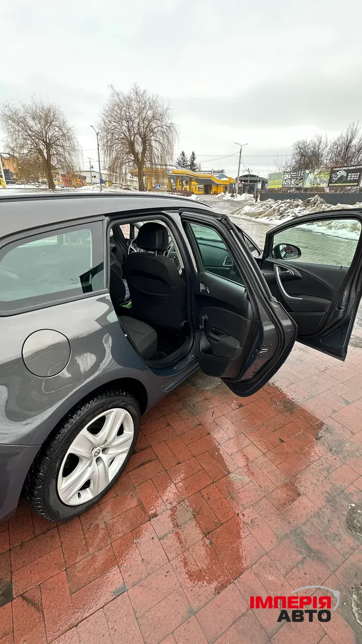 Opel Astra - фото 13