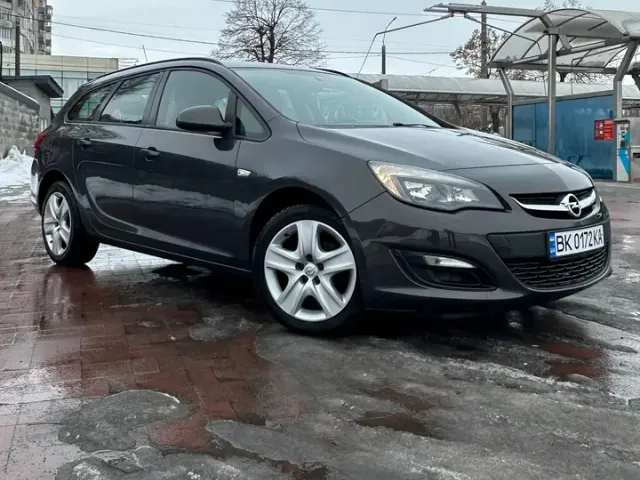 Opel Astra - фото 1