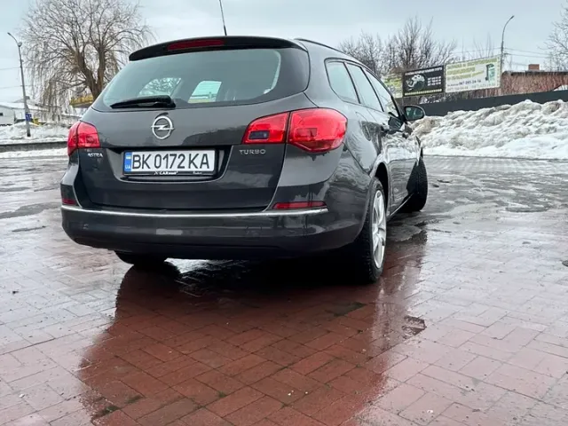 Opel Astra - фото 5