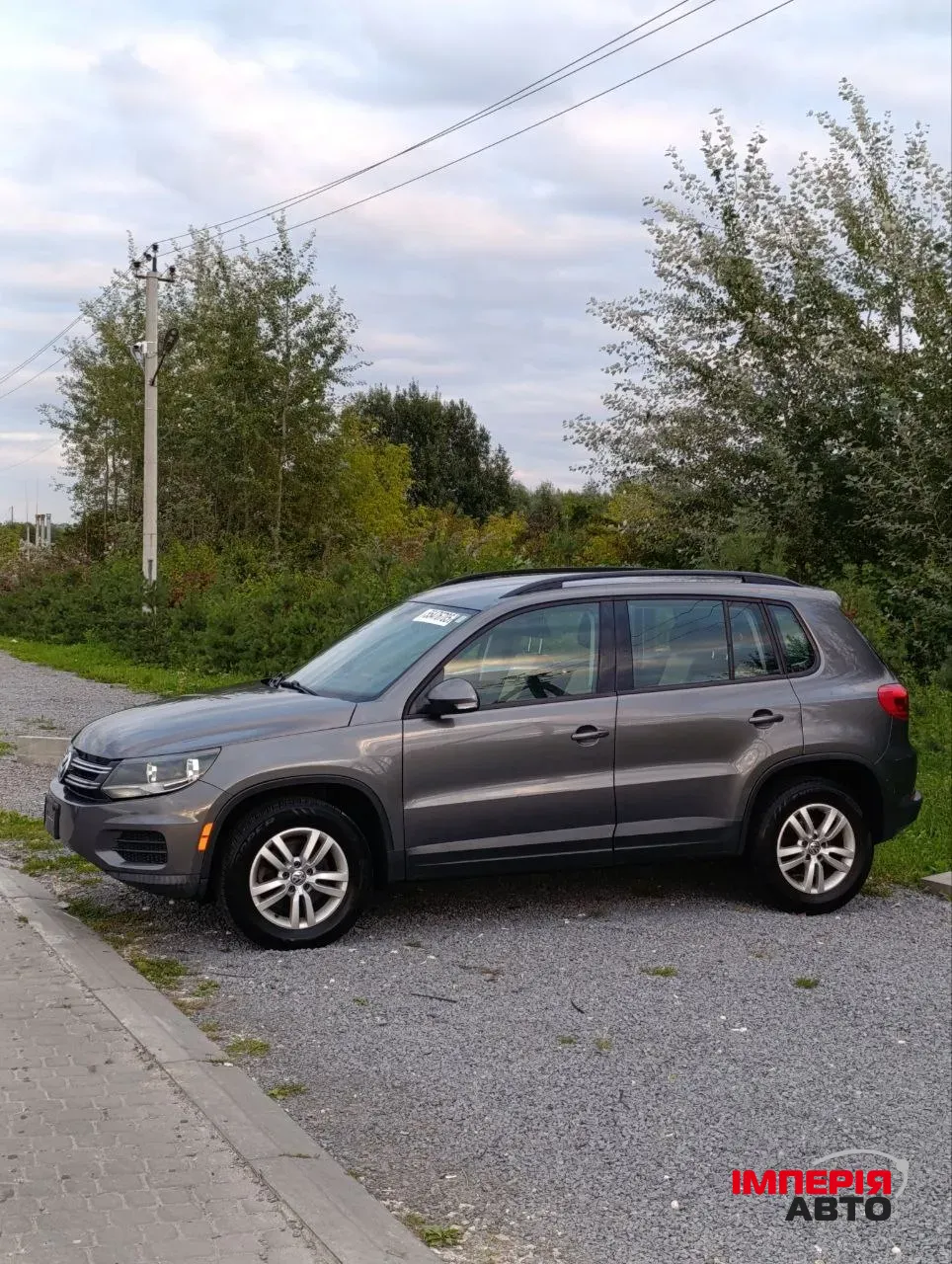 Volkswagen Tiguan - фото 2