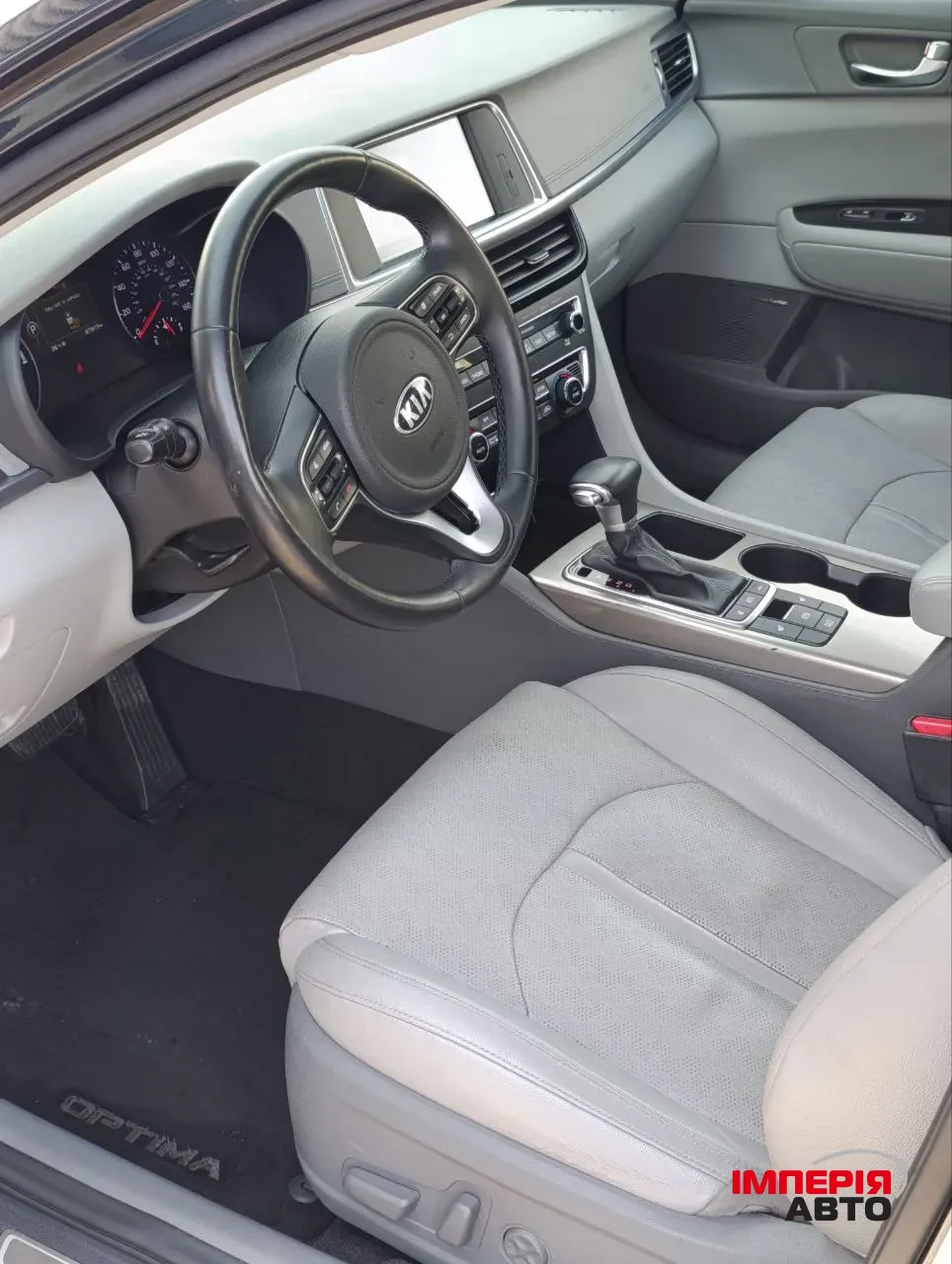 Kia Optima - фото 10