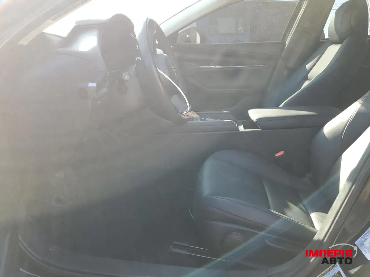 Mazda 3 - фото 7