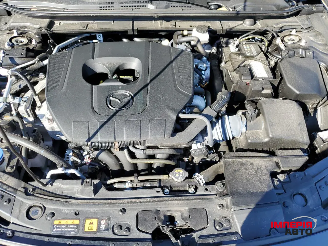 Mazda 3 - фото 11