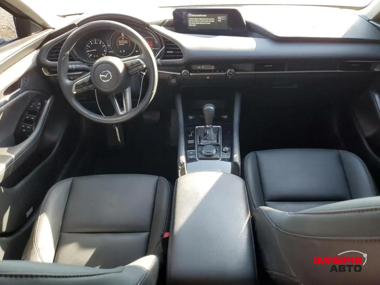 Mazda 3 - фото 8