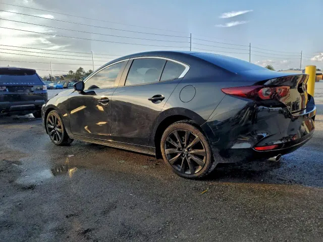 Mazda 3 - фото 2