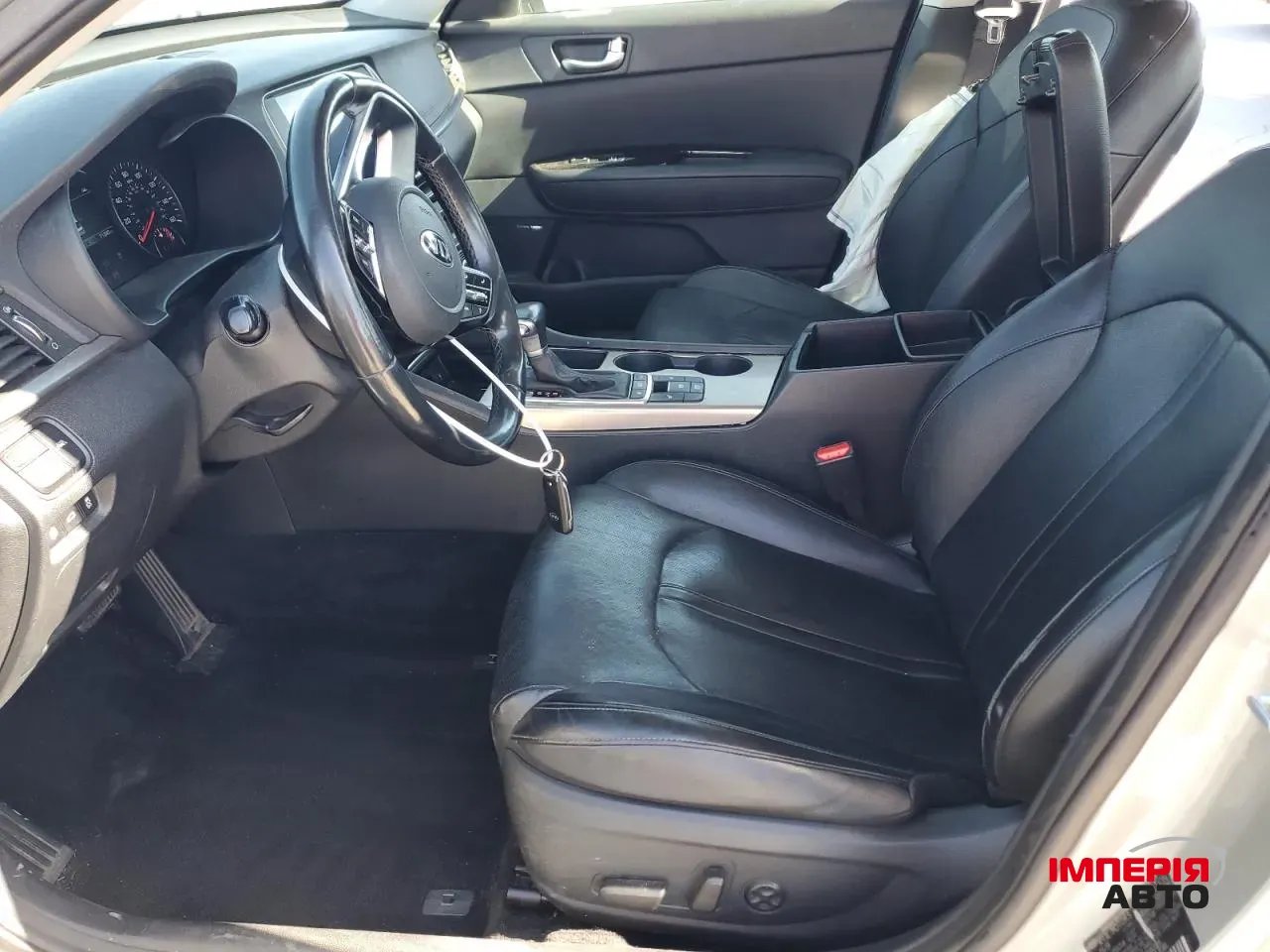 Kia Optima - фото 7