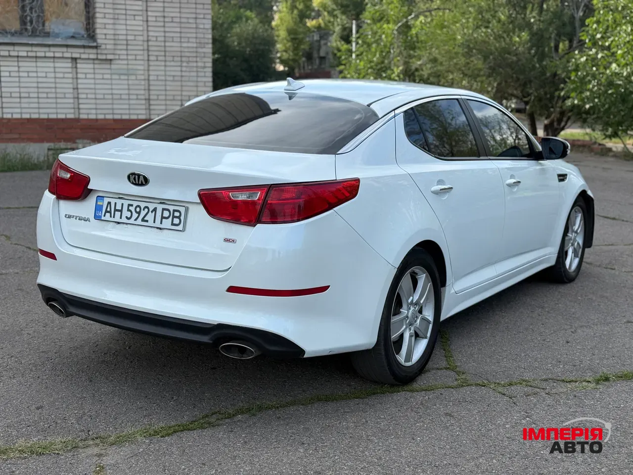 Kia Optima - фото 7