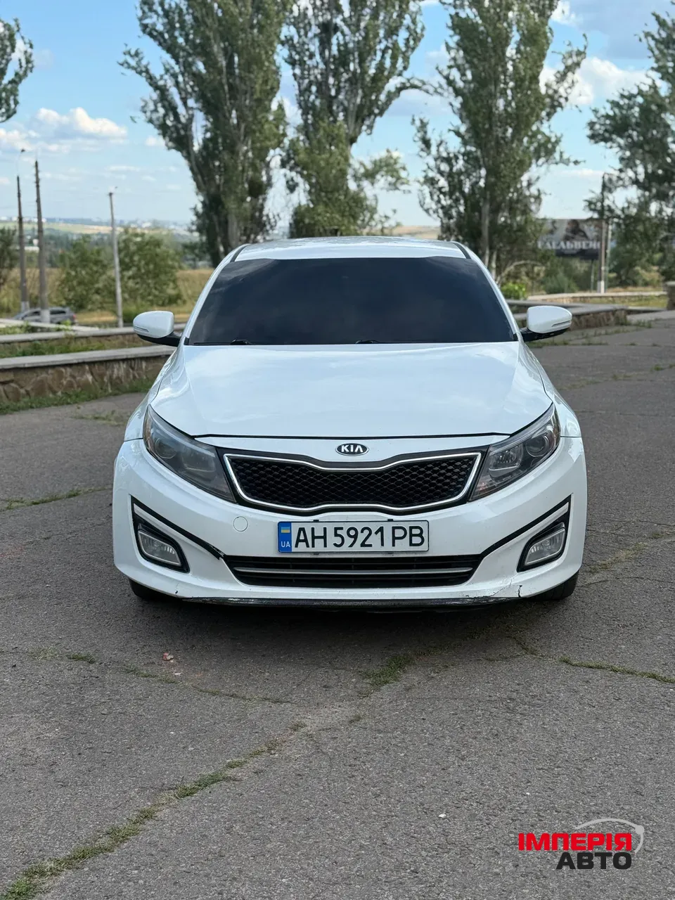 Kia Optima - фото 5
