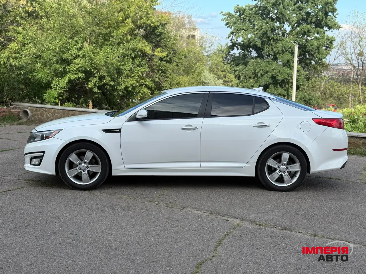 Kia Optima - фото 4
