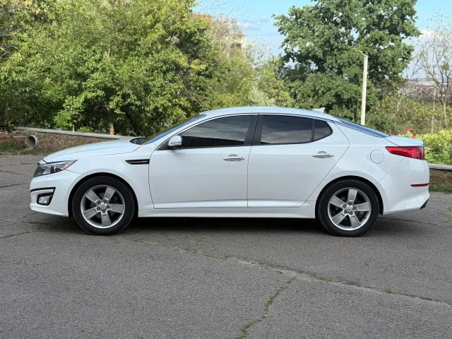Kia Optima - фото 4