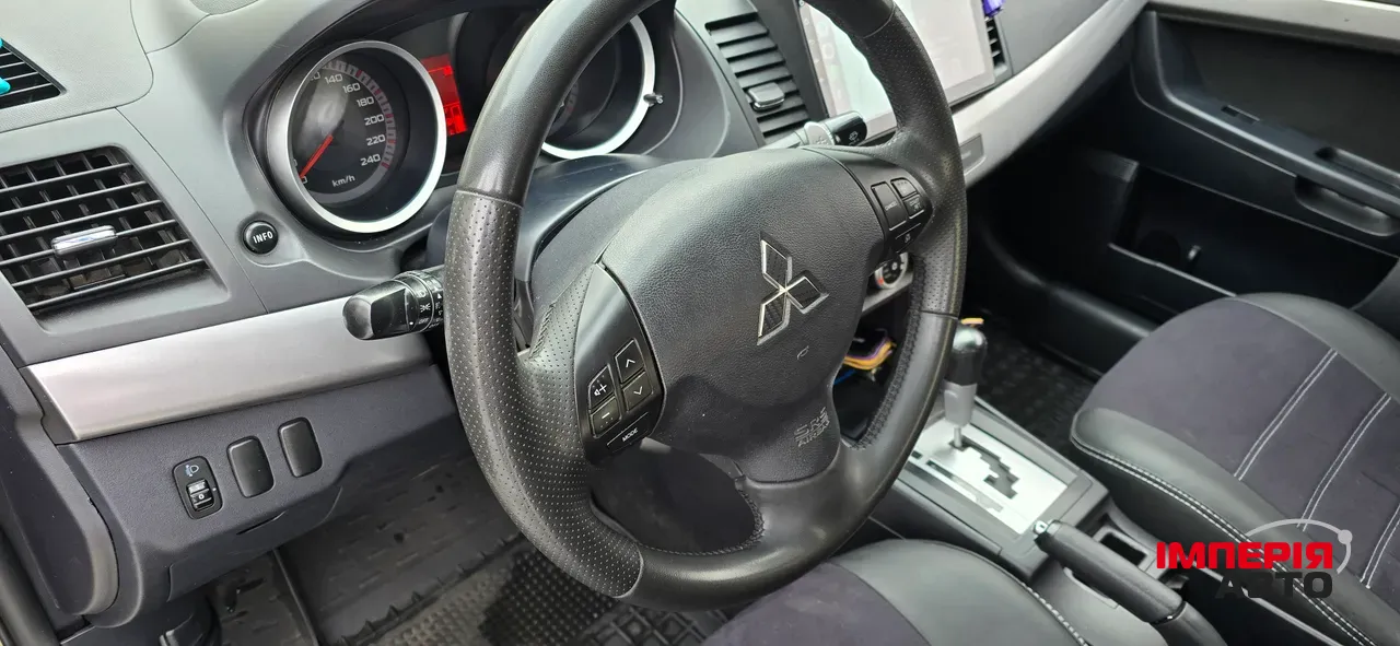 Mitsubishi Lancer - фото 4