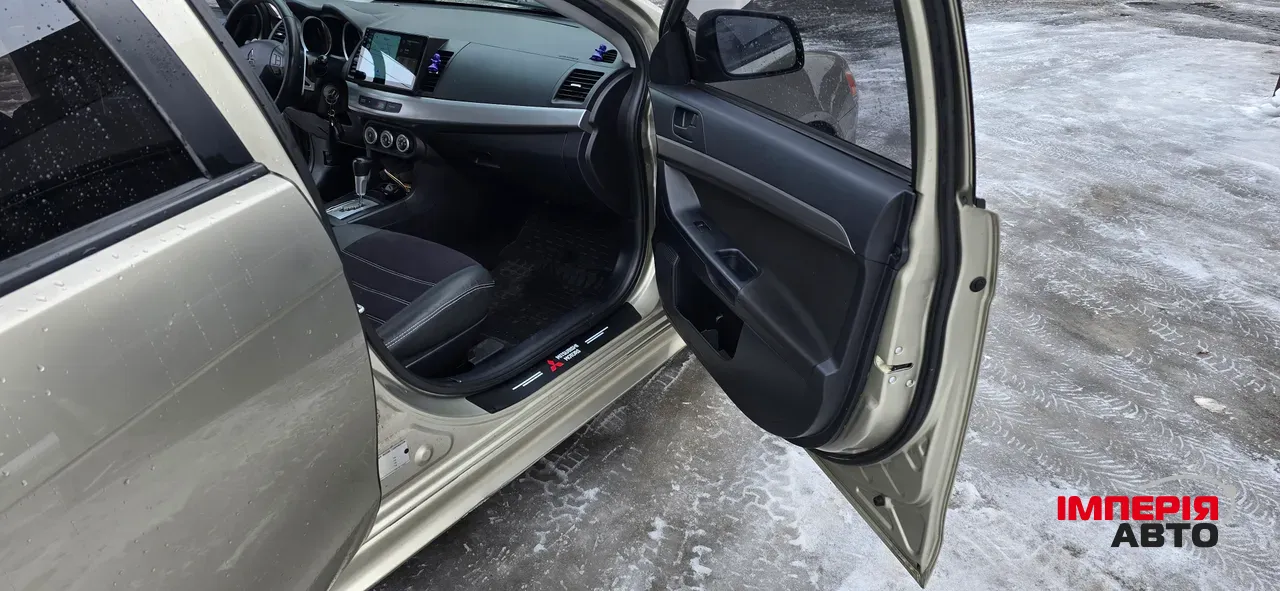 Mitsubishi Lancer - фото 9