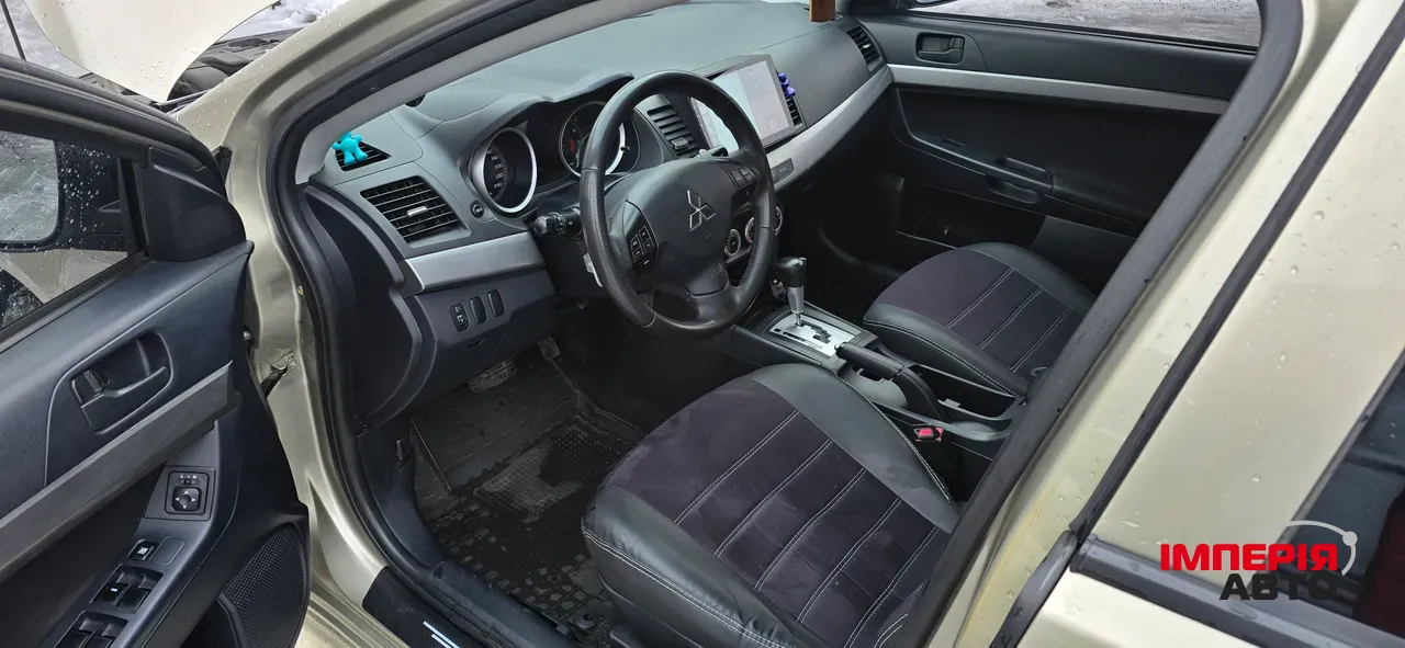 Mitsubishi Lancer - фото 6