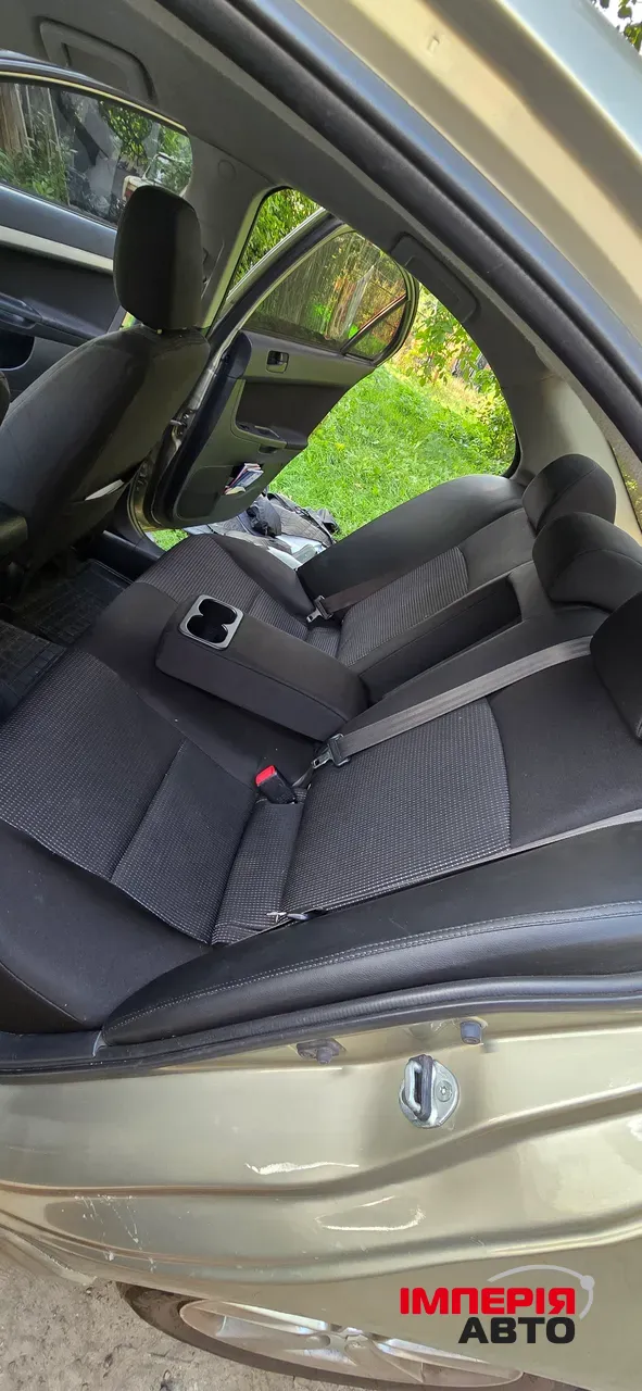 Mitsubishi Lancer - фото 18