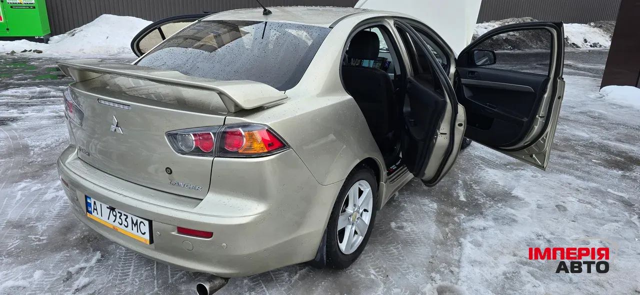 Mitsubishi Lancer - фото 12