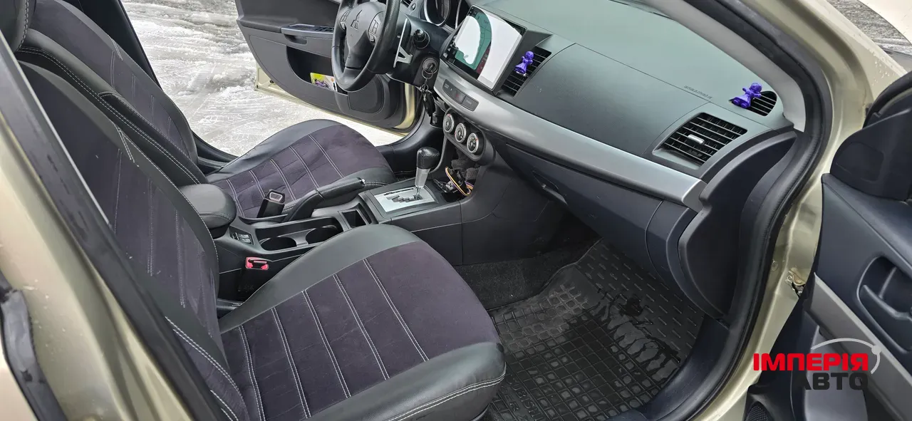 Mitsubishi Lancer - фото 7