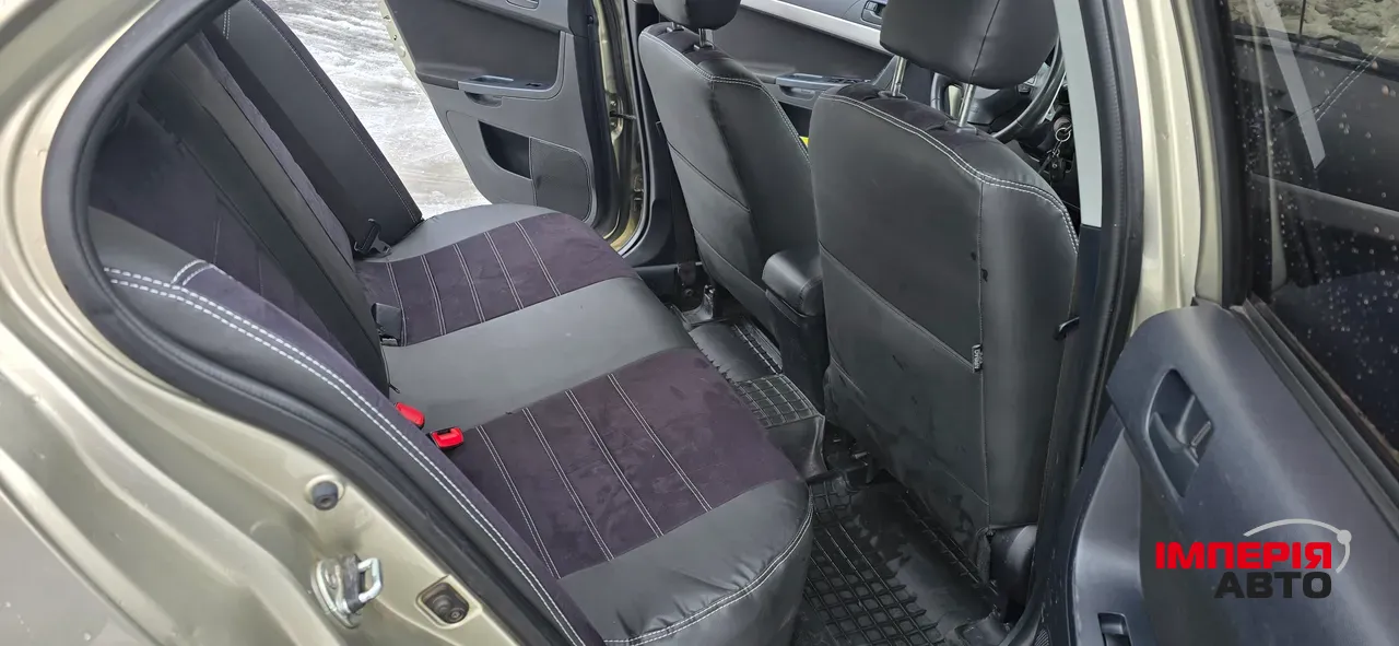 Mitsubishi Lancer - фото 8