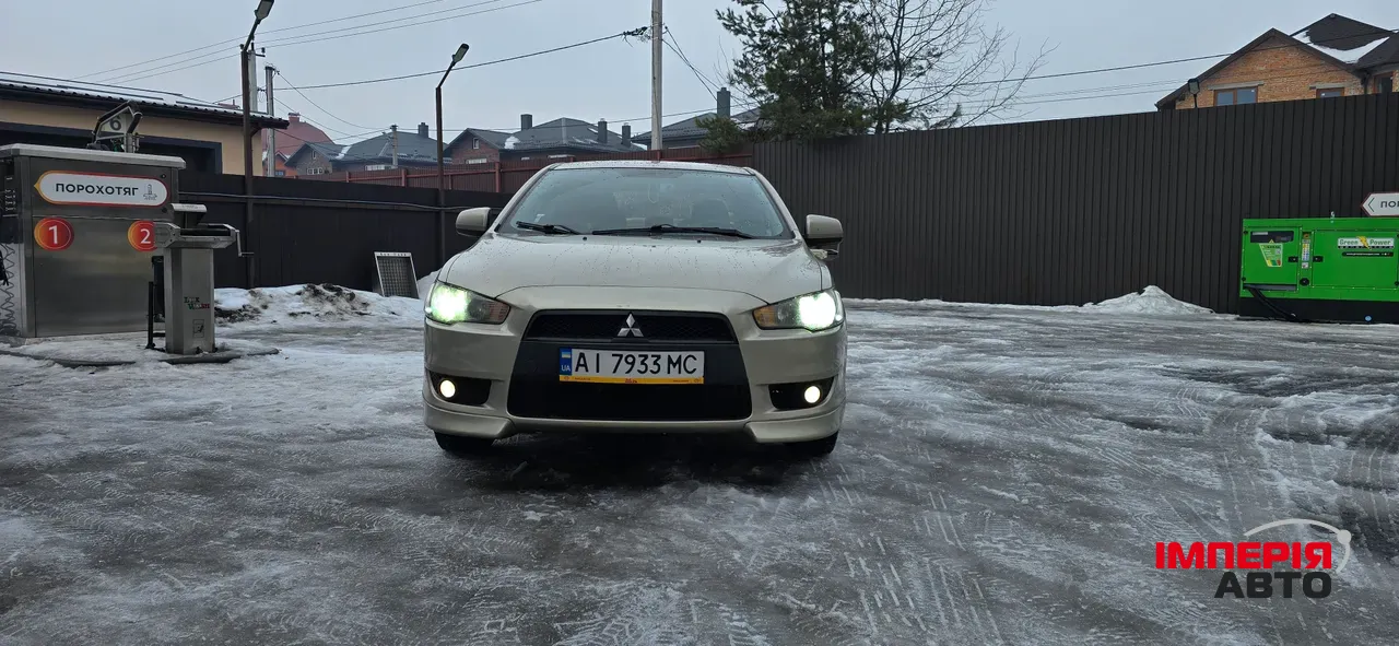 Mitsubishi Lancer - фото 1