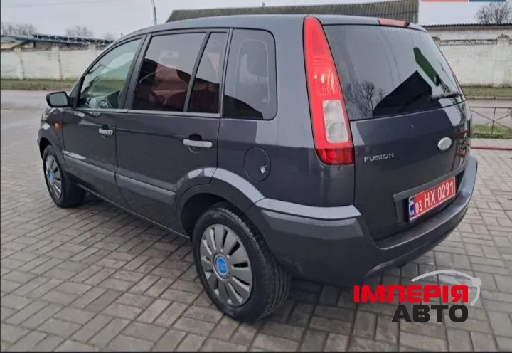 Ford Fusion - фото 7