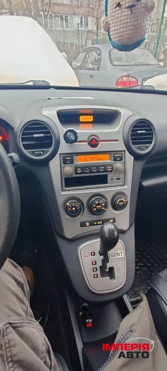 Kia Carens - фото 3