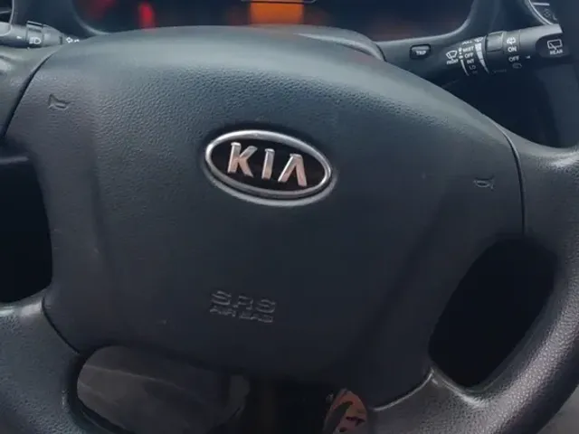Kia Carens - фото 4