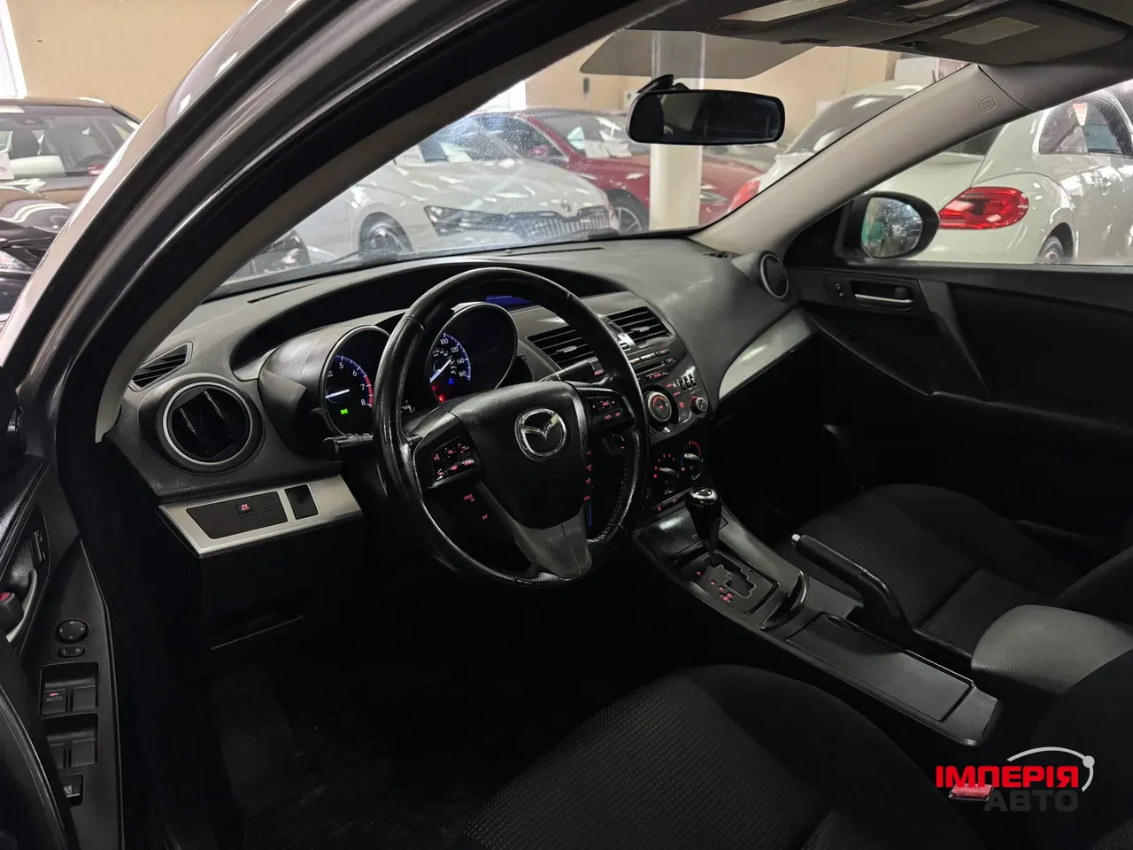 Mazda 3 - фото 8