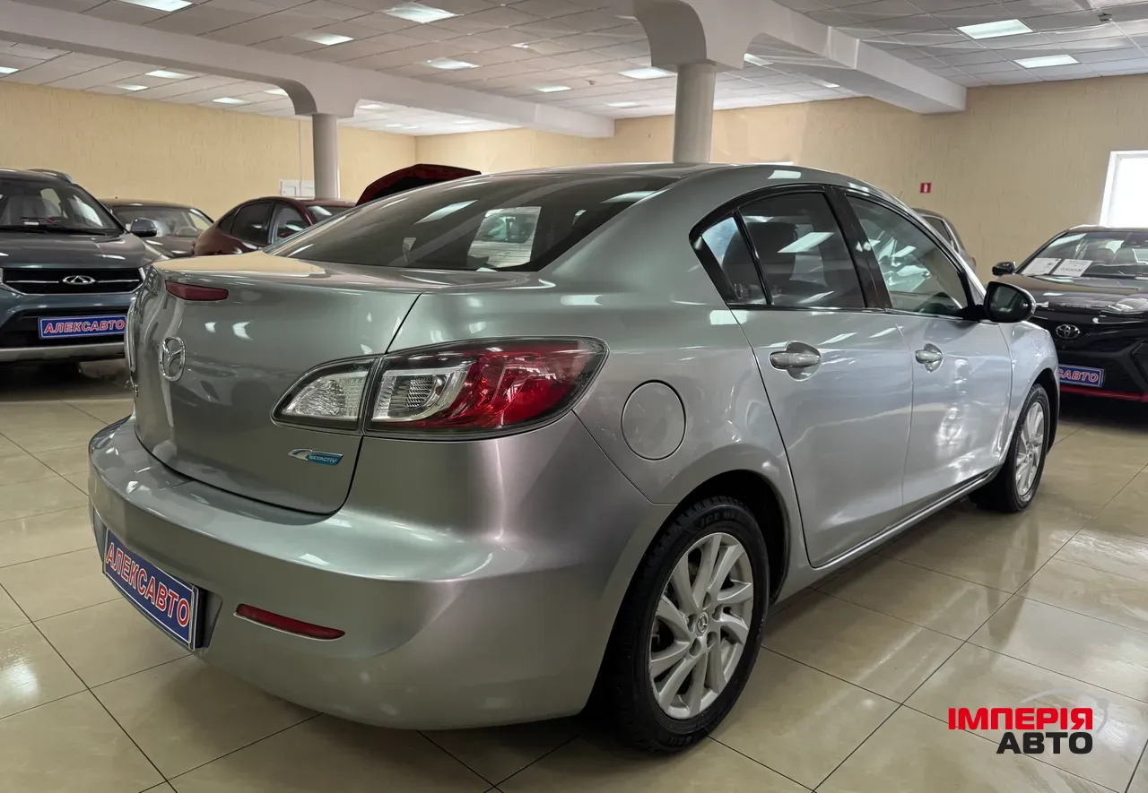 Mazda 3 - фото 4