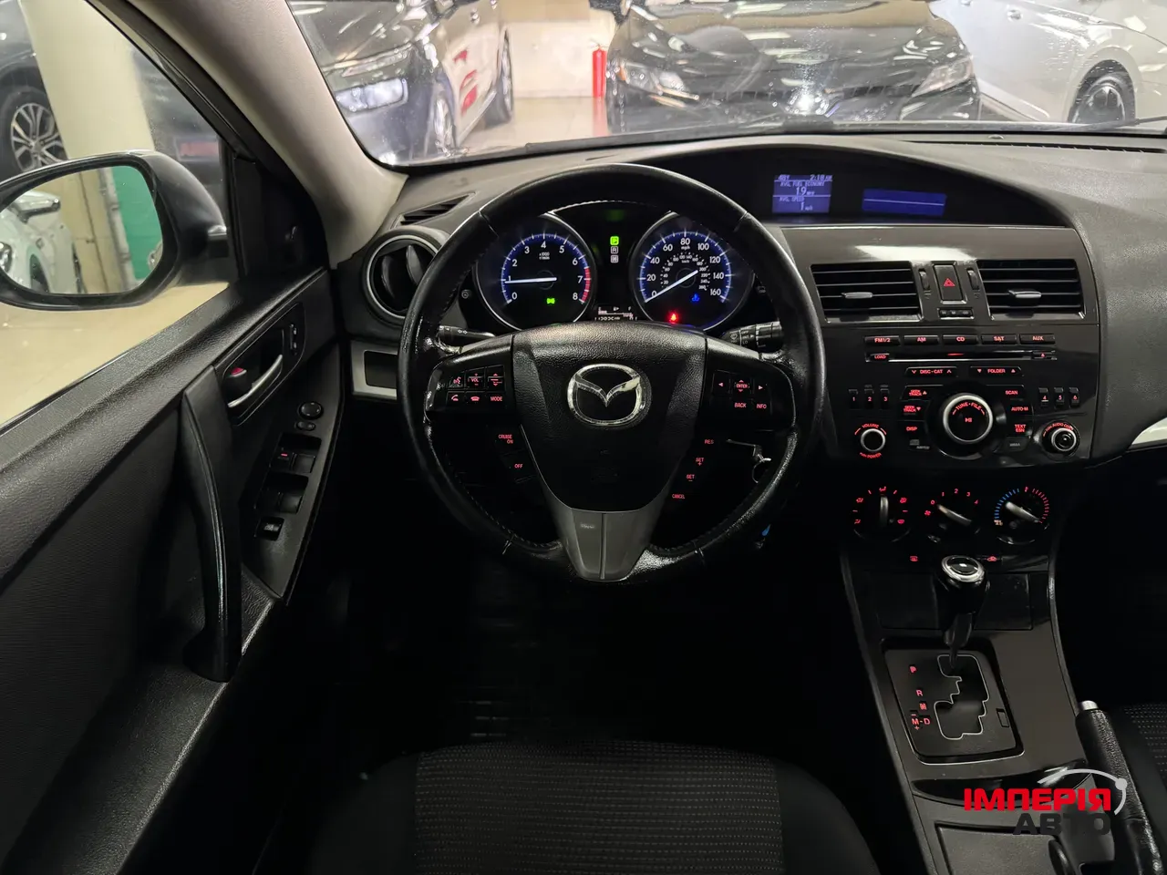 Mazda 3 - фото 10