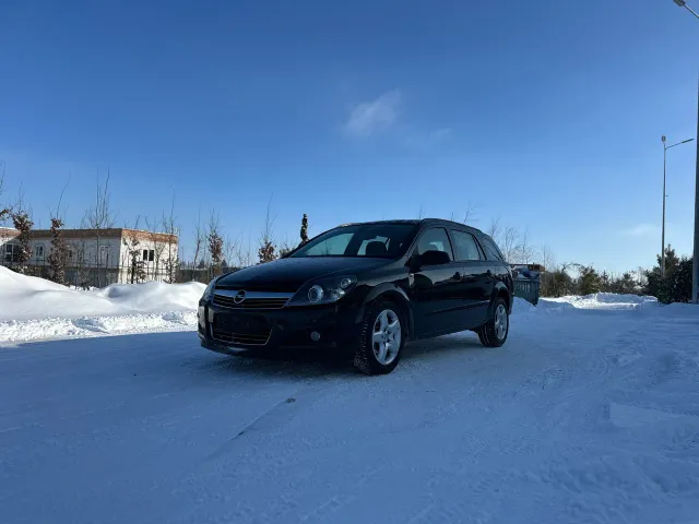 Opel Astra - фото 1