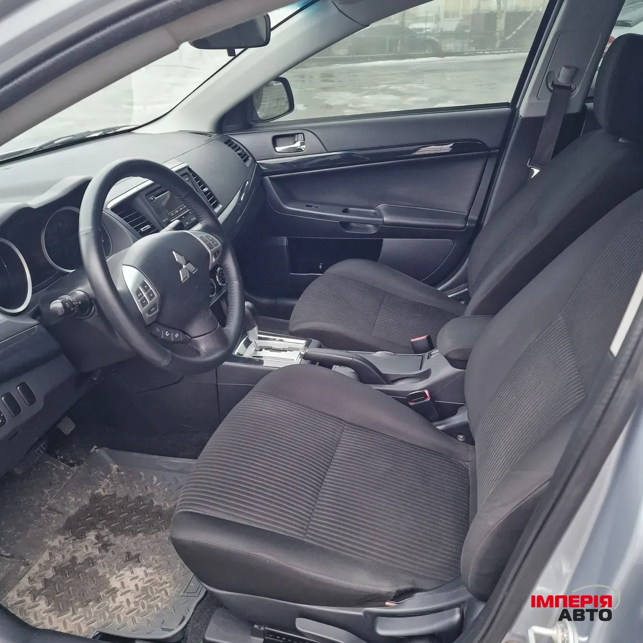 Mitsubishi Lancer - фото 11