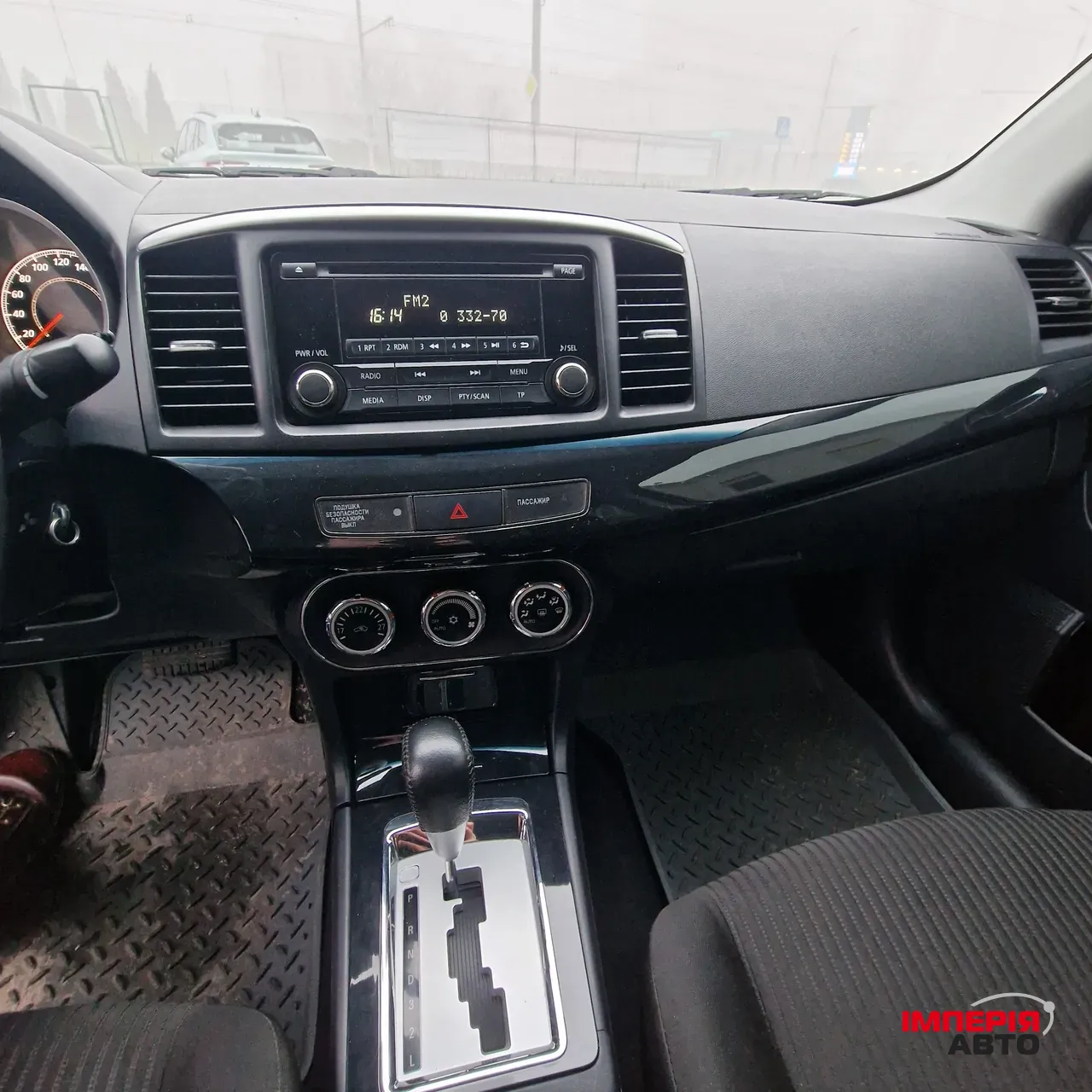 Mitsubishi Lancer - фото 13