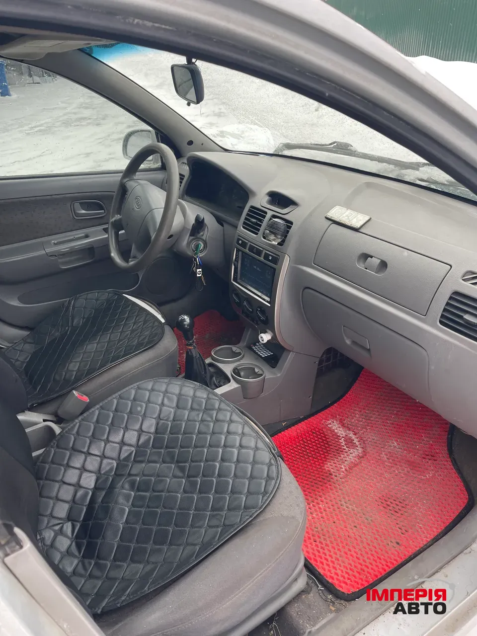 Kia Rio - фото 13