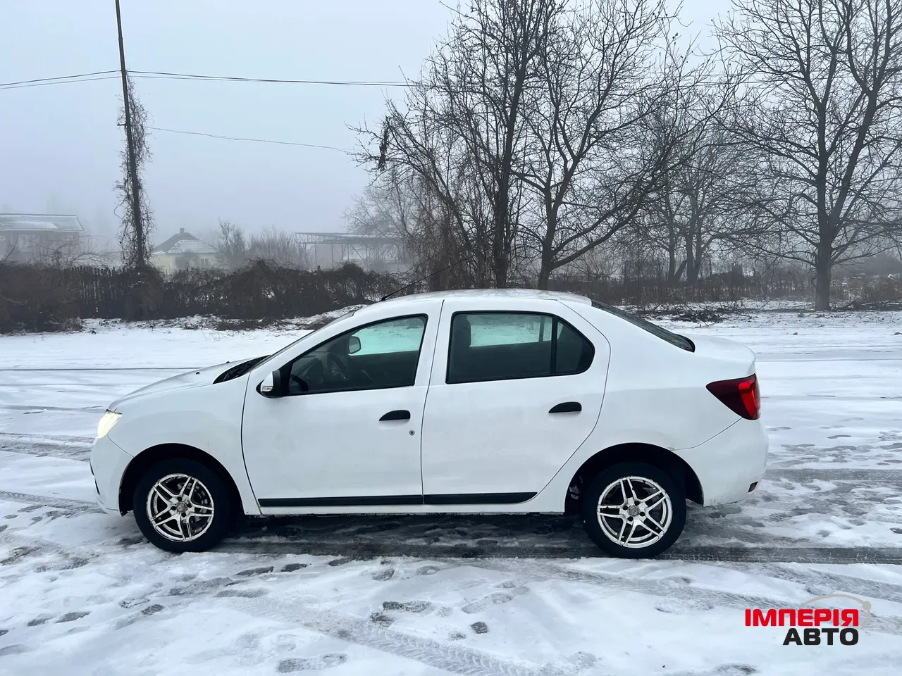 Renault Logan - фото 4