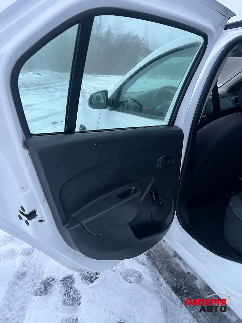 Renault Logan - фото 10