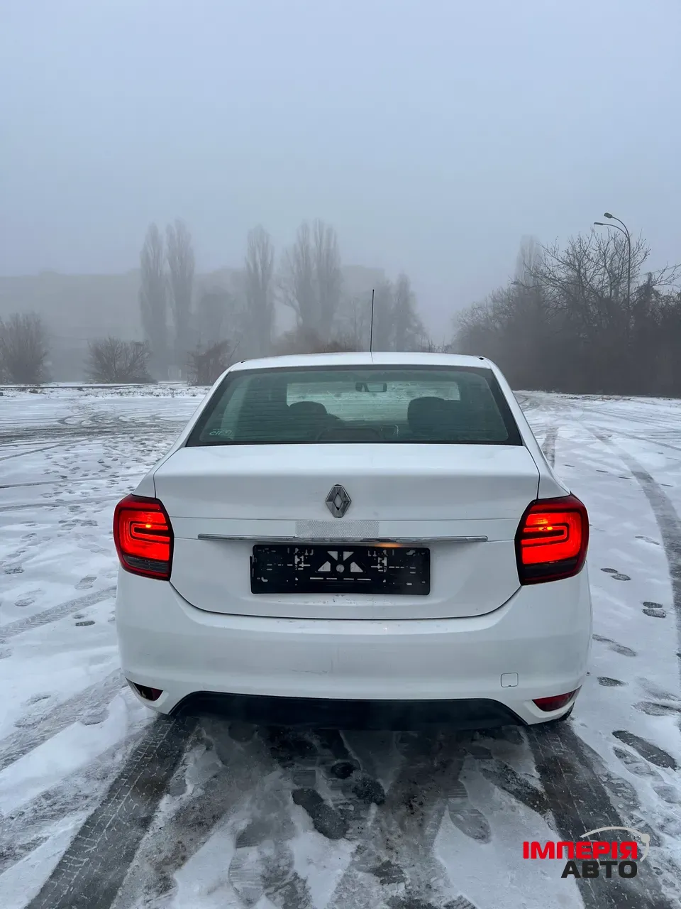 Renault Logan - фото 6