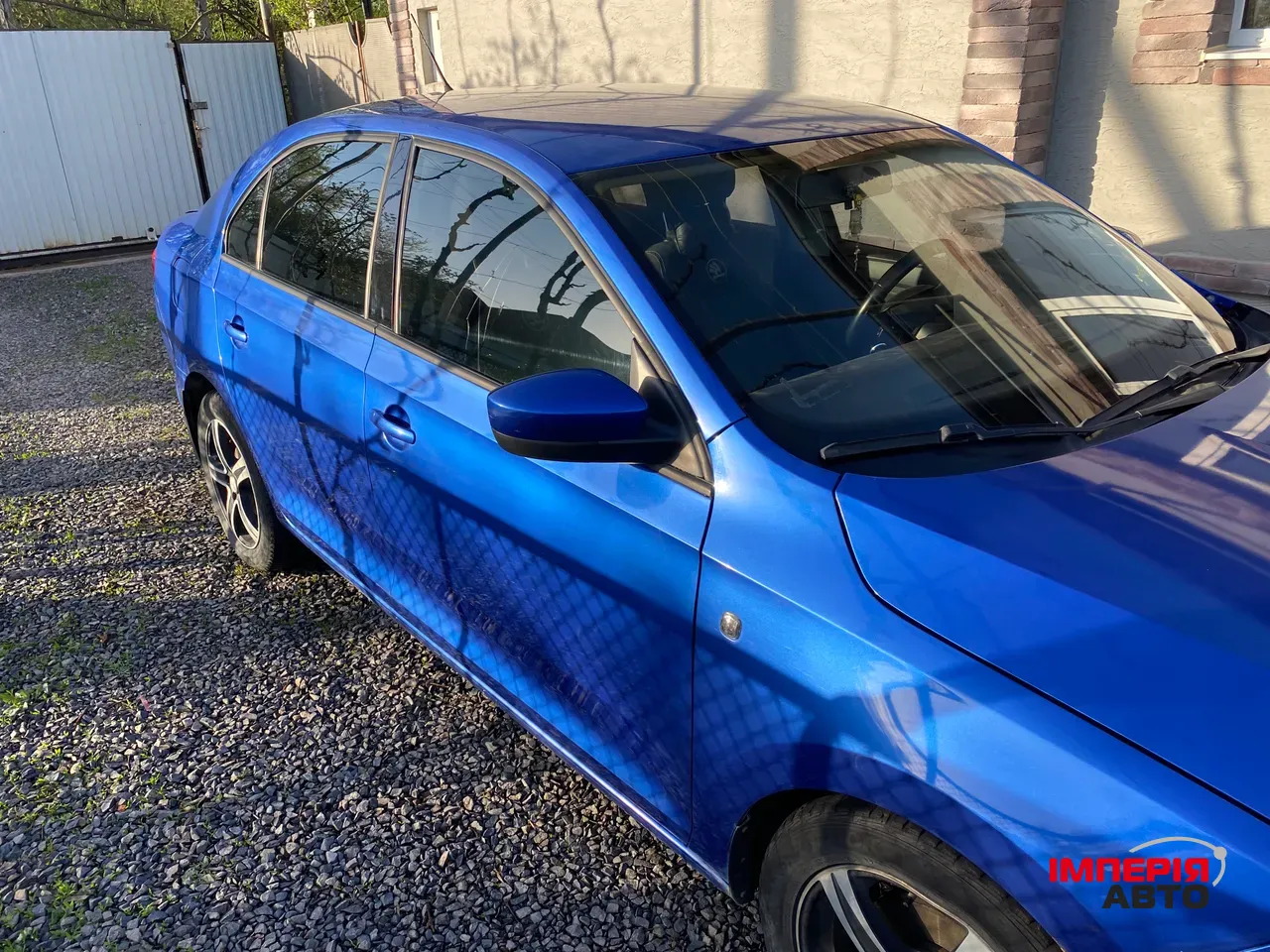 Skoda Rapid - фото 9