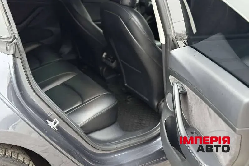 Tesla Model 3 - фото 12