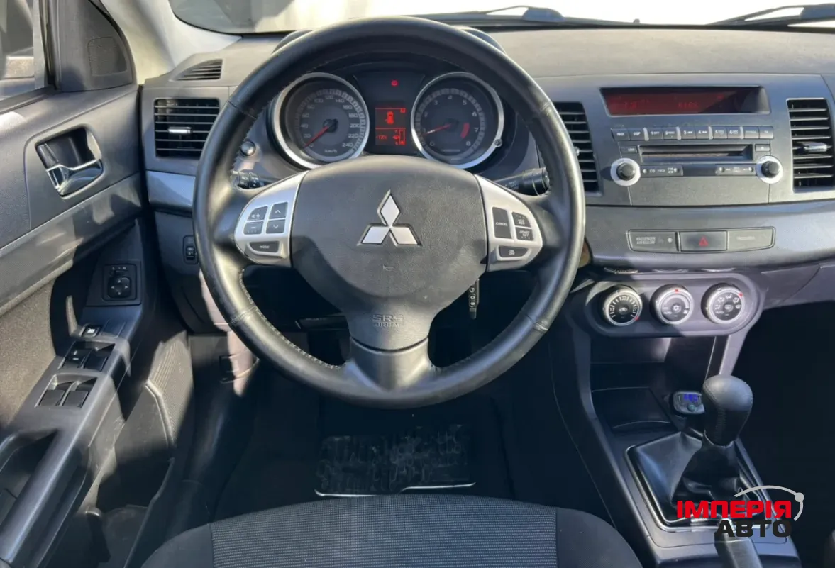 Mitsubishi Lancer - фото 7