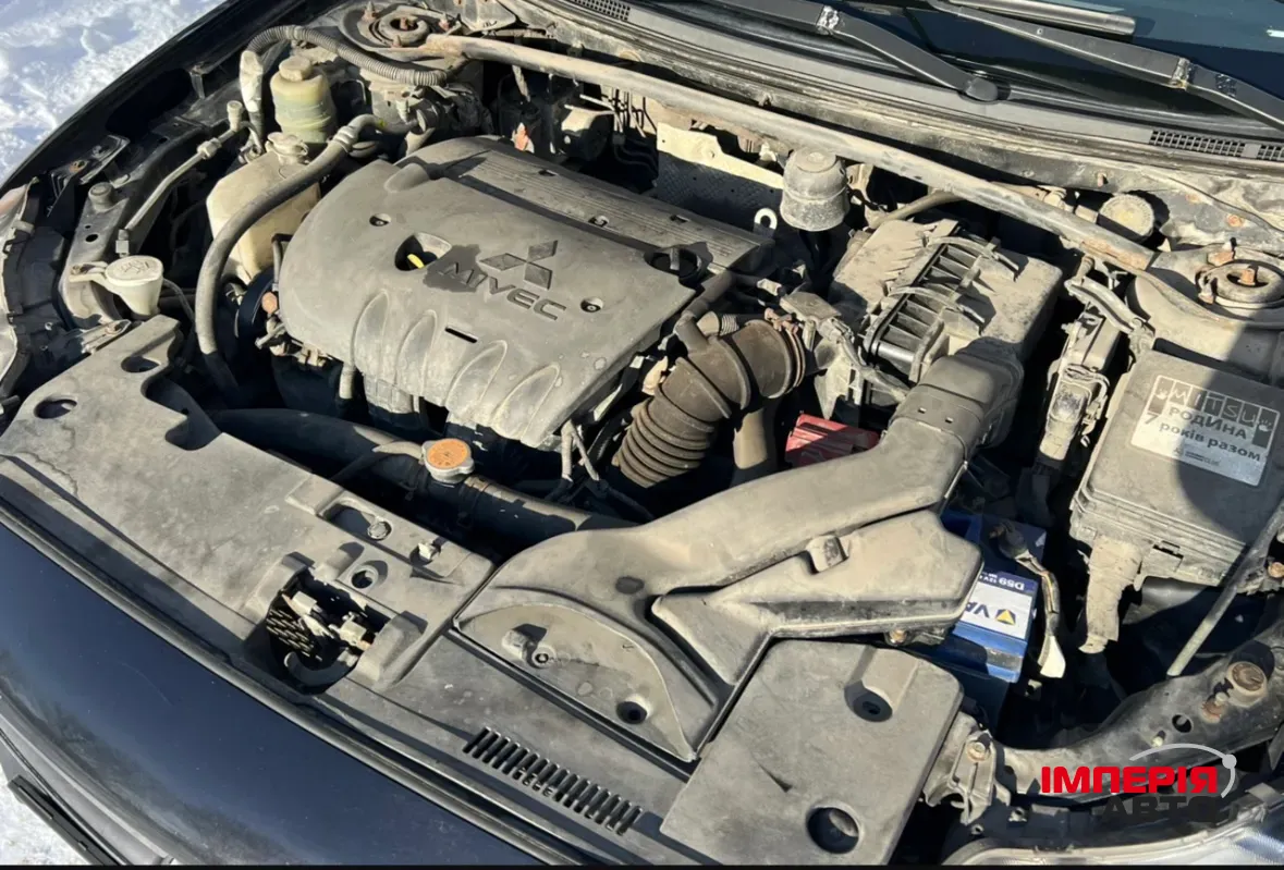 Mitsubishi Lancer - фото 13