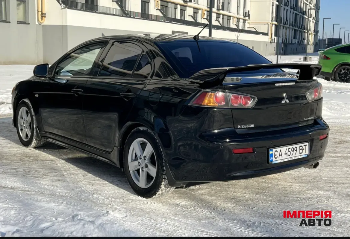 Mitsubishi Lancer - фото 3