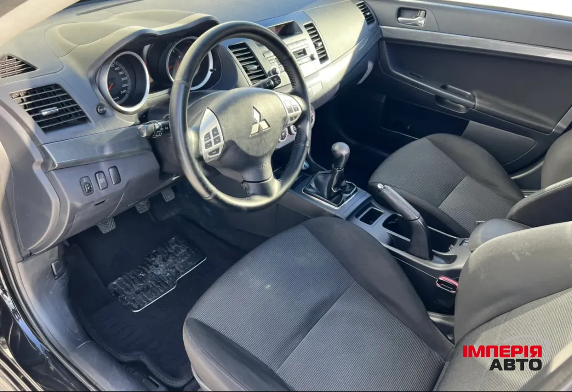 Mitsubishi Lancer - фото 6