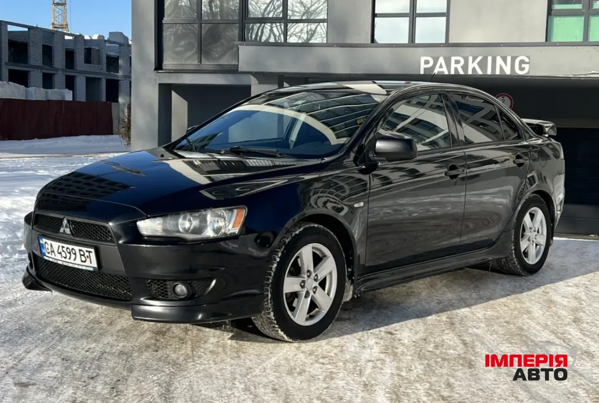 Mitsubishi Lancer - фото 1