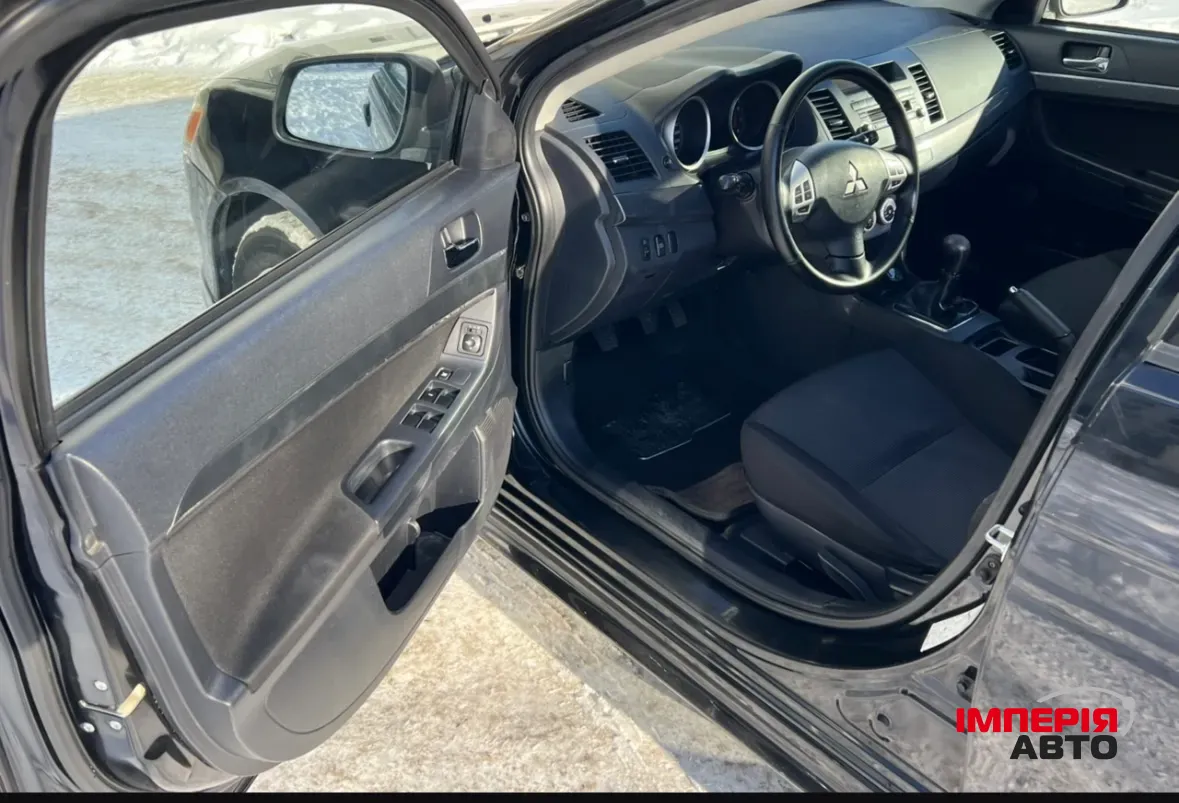 Mitsubishi Lancer - фото 5