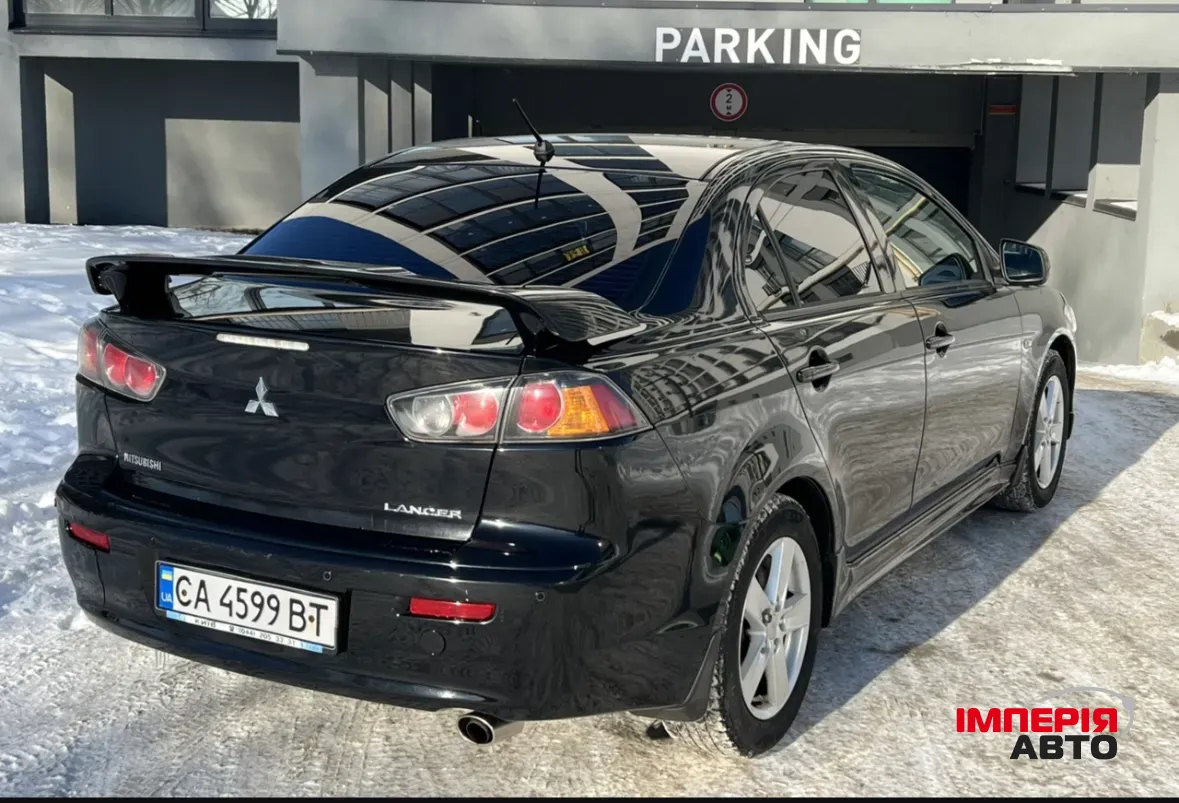 Mitsubishi Lancer - фото 4
