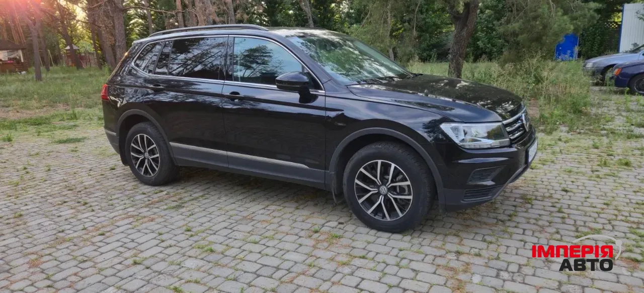Volkswagen Tiguan - фото 1