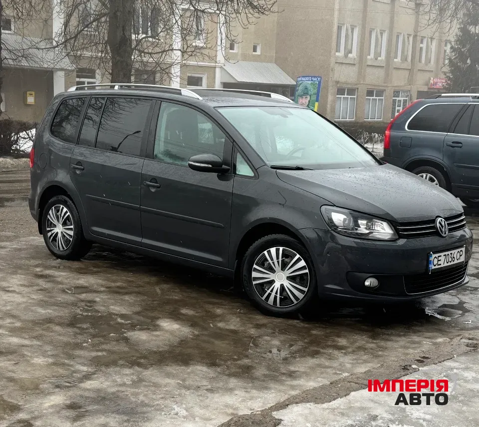 Volkswagen Touran - фото 8