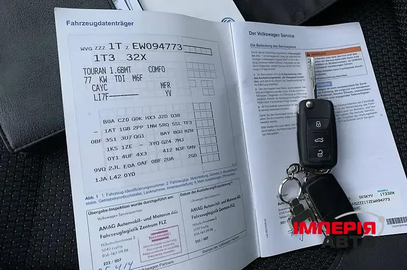 Volkswagen Touran - фото 5