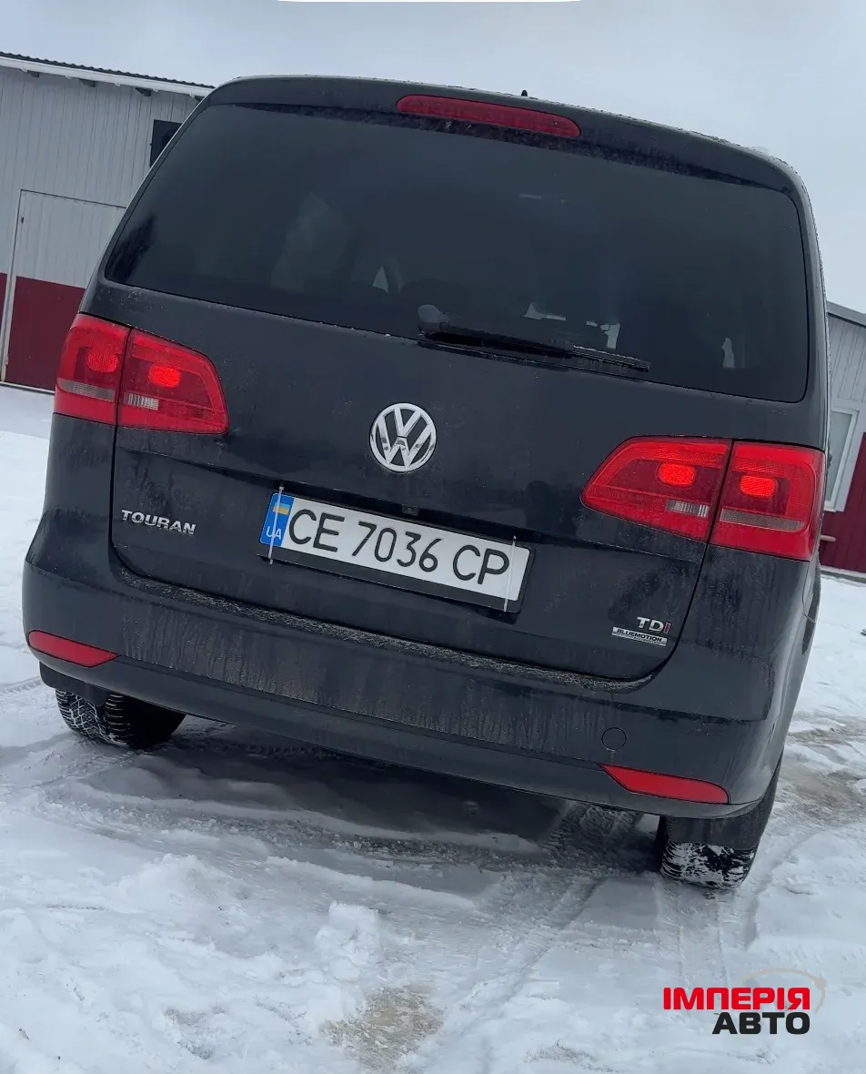 Volkswagen Touran - фото 2