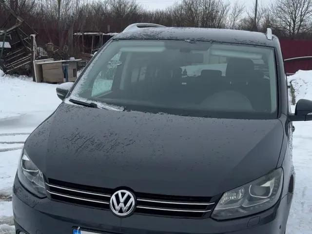 Volkswagen Touran - фото 1